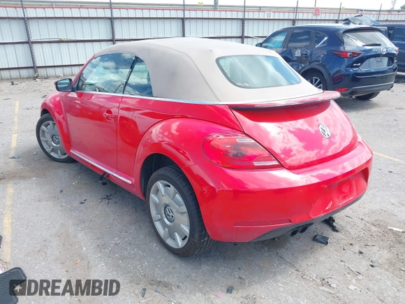 2015 Volkswagen Beetle 1.8T w/Tech with VIN 3VW517AT4FM803238, listed as a IAAI auction lot 41812373 with 42,369 mi miles and . Bid and sale history available at DreamBid. Image 3.