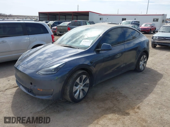 2022 Tesla Model Y Long Range with VIN 7SAYGDEE5NF534259, listed as a IAAI auction lot 41860246 with 24,513 mi miles and . Bid and sale history available at carsss.com. Image 2.
