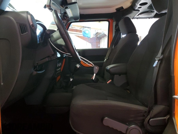2013 Jeep Wrangler Unlimited Sport with VIN 1C4BJWDG7DL557119, listed as a Copart auction lot 63186715 with 86,241 mi miles and Salvage title. Bid and sale history available at DreamBid. Image 7.