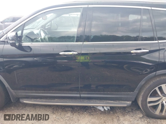 2017 Honda Pilot Touring with VIN 5FNYF5H99HB037126, listed as a IAAI auction lot 42275048 with 164,289 mi miles and . Bid and sale history available at DreamBid. Image 14.