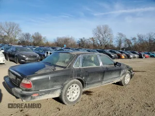 1998 Jaguar XJ with VIN SAJHX1245WC819762, listed as a Copart auction lot 81480174 with 132,491 mi miles and Salvage title. Bid and sale history available at DreamBid. Image 3.