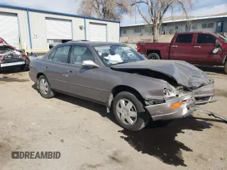 1994 Toyota Camry LE z VIN JT2GK12E2R0050878, wystawiony jako Copart lot #46878005 z przebiegiem 152 211 mil mil oraz Szkoda całkowita • Salvage title. Historia ofert i sprzedaży dostępna na DreamBid. Obrazek 4.