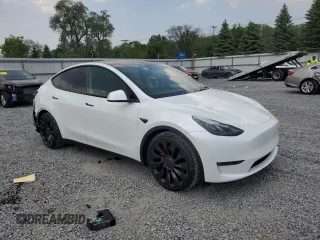 2022 Tesla Model Y Performance with VIN 7SAYGDEF1NF445085, listed as a Copart auction lot 58809495 with 14,832 mi miles and Salvage title. Bid and sale history available at DreamBid. Image 4.