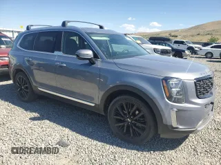2020 Kia Telluride SX with VIN 5XYP5DHC2LG061953, listed as a Copart auction lot 62049085 with 77,410 mi miles and Salvage title. Bid and sale history available at DreamBid. Image 4.