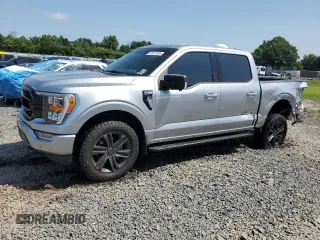 2021 Ford F-150 XL with VIN 1FTEW1EP2MFC38922, listed as a Copart auction lot 61471255 with 77,769 mi miles and Salvage title. Bid and sale history available at DreamBid. Image 1.