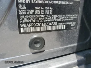 2014 BMW 5 Series 550i xDrive with VIN WBAKP9C51EDZ34830, listed as a Copart auction lot 59906435 with 123,709 mi miles and Salvage title. Bid and sale history available at DreamBid. Image 12.