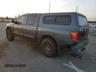 2007 Nissan Titan XE with VIN 1N6AA07A07N217705, listed as a Copart auction lot 86836804 with 272,228 mi miles and Salvage Title. Bid and sale history available at DreamBid. Image 2.