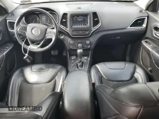 2019 Jeep Cherokee Altitude with VIN 1C4PJMLB0KD192192, listed as a Copart auction lot 55440485 with 132,164 mi miles and Salvage title. Bid and sale history available at DreamBid. Image 8.