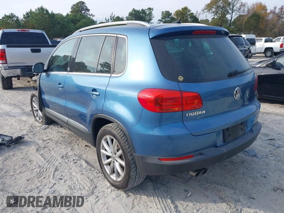 2017 Volkswagen Tiguan Wolfsburg Edition with VIN WVGRV7AX6HW504313, listed as a IAAI auction lot 40950812 with 149,884 mi miles and . Bid and sale history available at DreamBid. Image 3.