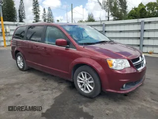 2019 Dodge Grand Caravan SXT with VIN 2C4RDGCGXKR807759, listed as a Copart auction lot 56098575 with 119,268 mi miles and Salvage Title. Bid and sale history available at DreamBid. Image 4.