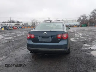 2009 Volkswagen Jetta SE z VIN 3VWRZ71K49M016683, wystawiony jako IAAI lot #41530644 z przebiegiem 106 148 mil mil oraz . Historia ofert i sprzedaży dostępna na DreamBid. Obrazek 16.