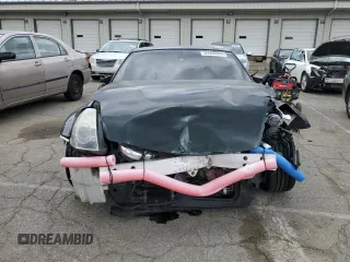 2007 Nissan 350Z Enthusiast z VIN JN1BZ34D87M502614, wystawiony jako Copart lot #53355955 z przebiegiem 70 416 mil mil oraz Szkoda całkowita • Salvage title. Historia ofert i sprzedaży dostępna na DreamBid. Obrazek 5.