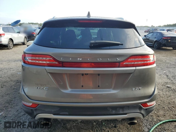 2017 Lincoln MKC Premiere z VIN 5LMCJ1C95HUL16078, wystawiony jako Copart lot #55853005 z przebiegiem 114 821 mil mil oraz Szkoda całkowita • Salvage title. Historia ofert i sprzedaży dostępna na DreamBid. Obrazek 6.