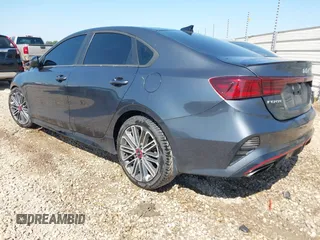 2022 Kia Forte GT with VIN 3KPF44AC7NE473424, listed as a IAAI auction lot 42003311 with 58,888 mi miles. Bid and sale history available at carsss.com. Image 3.