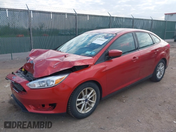 2018 Ford Focus SE with VIN 1FADP3FE6JL318552, listed as a IAAI auction lot 42090857 with 81,624 mi miles. Bid and sale history available at carsss.com. Image 2.