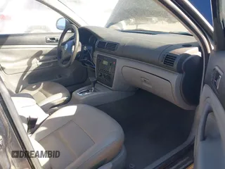 2004 Volkswagen Passat GL z VIN WVWND63B14E340616, wystawiony jako IAAI lot #41435210 z przebiegiem 175 452 mil mil oraz . Historia ofert i sprzedaży dostępna na DreamBid. Obrazek 5.