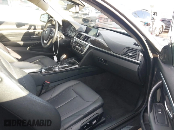 2014 BMW 4 Series 428i with VIN WBA3N7C5XEF719384, listed as a IAAI auction lot 41694678 with 115,517 mi miles and . Bid and sale history available at carsss.com. Image 5.