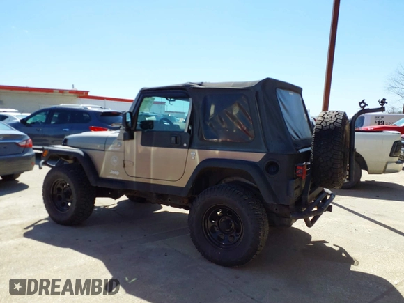 2005 Jeep Wrangler Sport with VIN 1J4FA49S45P345673, listed as a IAAI auction lot 41830128 with 139,432 mi miles. Bid and sale history available at carsss.com. Image 14.