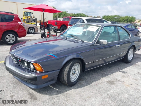 1986 BMW 6 Series 635CSi with VIN WBAEC840XG0613529, listed as a IAAI auction lot 42060435 with 1 mi miles. Bid and sale history available at carsss.com. Image 2.