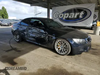 2012 BMW M3 with VIN WBSKG9C57CE798240, listed as a Copart auction lot 61774515 with 83,322 mi miles and Salvage title. Bid and sale history available at DreamBid. Image 4.
