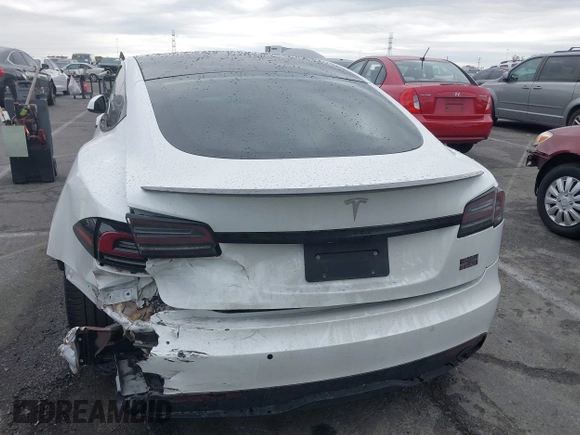 2022 Tesla Model S Plaid with VIN 5YJSA1E65NF488864, listed as a IAAI auction lot 41772788 with 33,915 mi miles and . Bid and sale history available at DreamBid. Image 16.