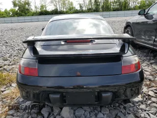 1999 Porsche 911 z VIN WP0AA2990XS626600, wystawiony jako Copart lot #56749505 z przebiegiem 82 979 mil mil oraz Szkody całkowita. Historia ofert i sprzedaży dostępna na DreamBid. Obrazek 6.
