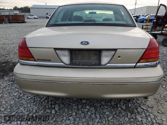 1999 Ford Crown Victoria z VIN 2FAFP73W4XX137040, wystawiony jako Copart lot #83741244 z przebiegiem 142 901 mil mil oraz Szkoda całkowita • Salvage title. Historia ofert i sprzedaży dostępna na DreamBid. Obrazek 6.