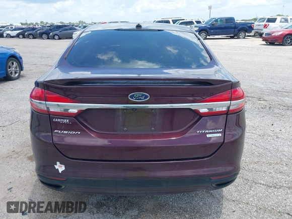 2018 Ford Fusion Titanium with VIN 3FA6P0K92JR114283, listed as a IAAI auction lot 42704476 with 92,502 mi miles and . Bid and sale history available at DreamBid. Image 16.
