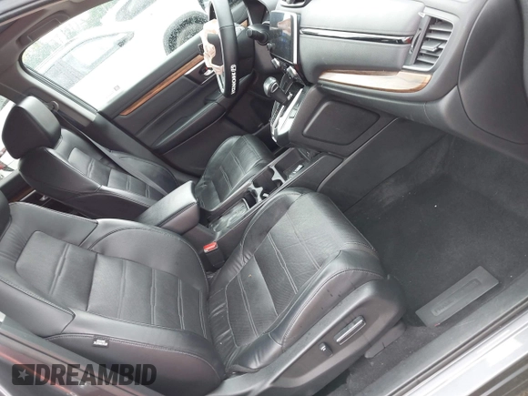 2021 Honda CR-V EX-L with VIN 2HKRW2H83MH607305, listed as a IAAI auction lot 42254257 with 73,291 mi miles and . Bid and sale history available at DreamBid. Image 5.