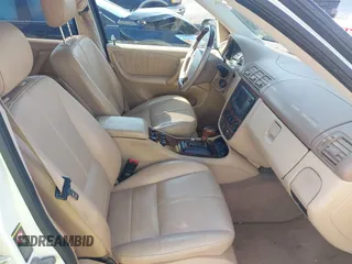 2000 Mercedes-Benz M with VIN 4JGAB54E4YA145383, listed as a IAAI auction lot 42108505 with 266,728 mi miles. Bid and sale history available at carsss.com. Image 5.