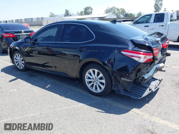 2020 Toyota Camry LE with VIN 4T1C11AKXLU955851, listed as a IAAI auction lot 41996827 with 59,008 mi miles and . Bid and sale history available at carsss.com. Image 3.