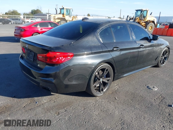2019 BMW 5 Series M550i xDrive with VIN WBAJB9C51KB288416, listed as a IAAI auction lot 41265378 with 52,529 mi miles and . Bid and sale history available at DreamBid. Image 4.
