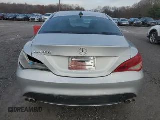 2014 Mercedes-Benz CLA 250 z VIN WDDSJ4EB6EN050814, wystawiony jako Copart lot #80908514 z przebiegiem 85 314 mil mil oraz Szkoda całkowita • Salvage title. Historia ofert i sprzedaży dostępna na DreamBid. Obrazek 6.
