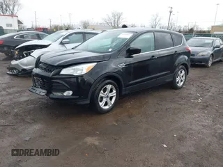 2016 Ford Escape SE with VIN 1FMCU0G78GUB56029, listed as a IAAI auction lot 41904627 with 102,685 mi miles. Bid and sale history available at carsss.com. Image 2.