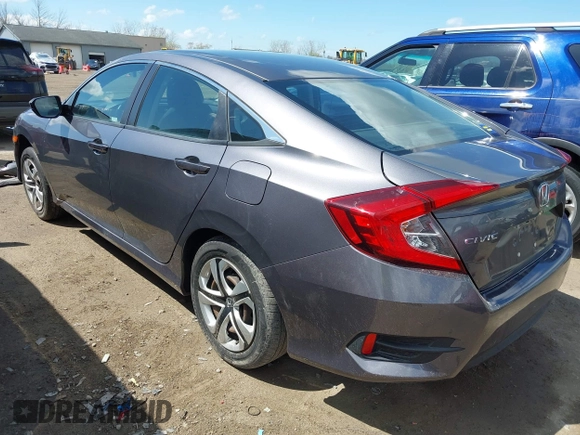 2018 Honda Civic LX with VIN 2HGFC2F5XJH586527, listed as a IAAI auction lot 42080372 with 52,114 mi miles and . Bid and sale history available at DreamBid. Image 3.