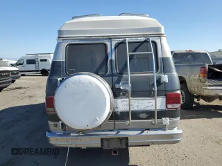 1989 Chevrolet Chevy Van z VIN 1GBEG25KXK7127909, wystawiony jako Copart lot #59997315 z przebiegiem 550 289 mil mil oraz Czysty tytuł • Clean title. Historia ofert i sprzedaży dostępna na DreamBid. Obrazek 6.