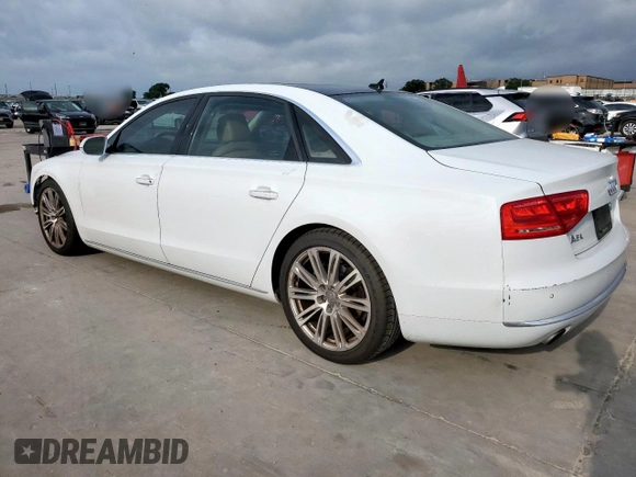 2014 Audi A8 3.0T with VIN WAURGAFD1EN013057, listed as a Copart auction lot 61161595 with 103,560 mi miles and Salvage title. Bid and sale history available at DreamBid. Image 2.