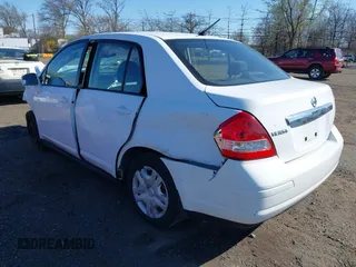 2011 Nissan Versa 1.8 S with VIN 3N1BC1AP5BL390720, listed as a IAAI auction lot 41962212 with 120,516 mi miles. Bid and sale history available at carsss.com. Image 3.