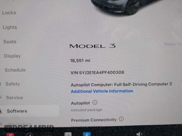 2023 Tesla Model 3 with VIN 5YJ3E1EA4PF400306, listed as a IAAI auction lot 42398603 with 18,551 mi miles and . Bid and sale history available at DreamBid. Image 7.