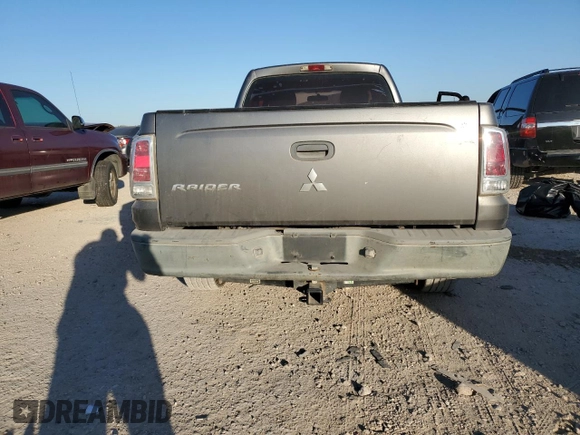 2008 Mitsubishi Raider LS z VIN 1Z7HC22KX8S609878, wystawiony jako Copart lot #85869764 z przebiegiem 163 672 mil mil oraz Szkoda całkowita • Salvage title. Historia ofert i sprzedaży dostępna na DreamBid. Obrazek 6.