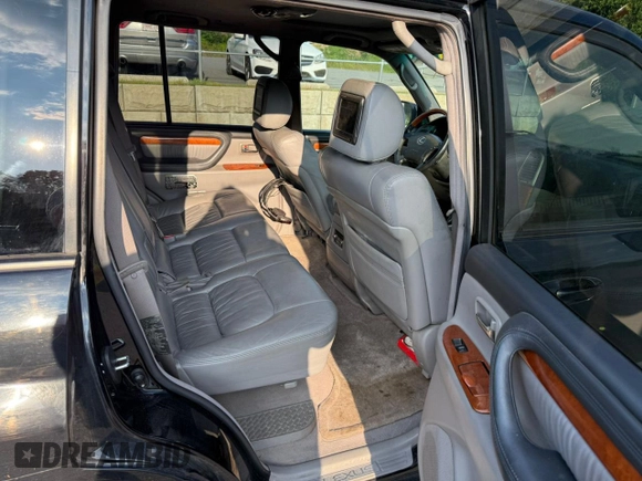 2004 Lexus LX 470 with VIN JTJHT00W44354386, listed as a Copart auction lot 63816455 with 389,442 mi miles and Clean title. Bid and sale history available at DreamBid. Image 6.