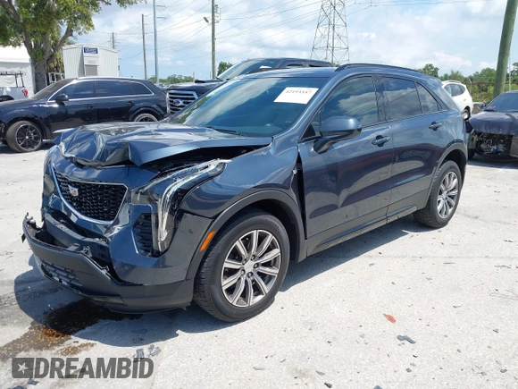 2019 Cadillac XT4 FWD Sport with VIN 1GYFZER42KF107032, listed as a IAAI auction lot 42193557 with 96,615 mi miles and . Bid and sale history available at DreamBid. Image 2.