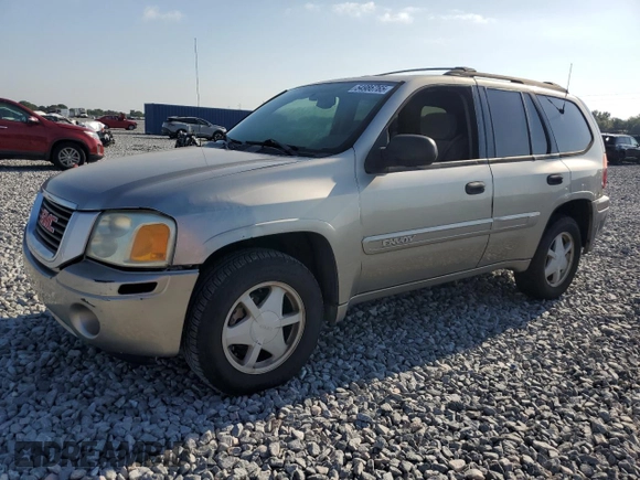 2003 GMC Envoy SLT z VIN 1GKDS13S032373020, wystawiony jako Copart lot #54986765 z przebiegiem 235 711 mil mil oraz Tytuł czysty. Historia ofert i sprzedaży dostępna na DreamBid. Obrazek 1.