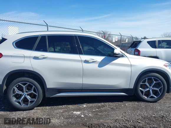 2019 BMW X1 xDrive28i with VIN WBXHT3C58K5N05523, listed as a IAAI auction lot 41752675 with 63,861 mi miles. Bid and sale history available at carsss.com. Image 13.