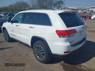 2019 Jeep Grand Cherokee Limited with VIN 1C4RJFBG7KC579264, listed as a IAAI auction lot 42000512 with 61,419 mi miles. Bid and sale history available at carsss.com. Image 3.