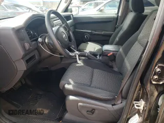2009 Jeep Commander Sport z VIN 1J8HG48K39C554570, wystawiony jako Copart lot #52667825 z przebiegiem 194 886 mil mil oraz Szkoda całkowita • Salvage title. Historia ofert i sprzedaży dostępna na DreamBid. Obrazek 7.