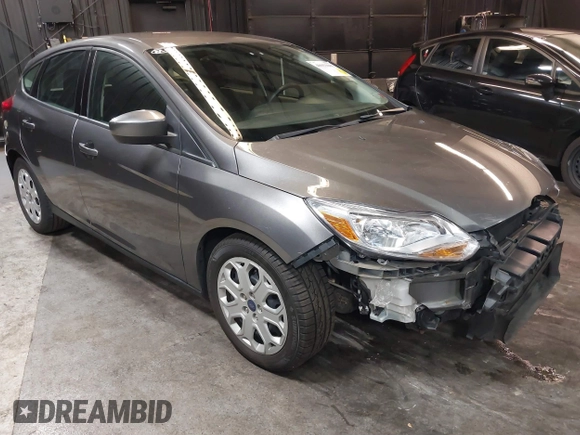 2012 Ford Focus SE with VIN 1FAHP3K22CL394088, listed as a IAAI auction lot 40953085 with 147,259 mi miles and . Bid and sale history available at carsss.com. Image 1.