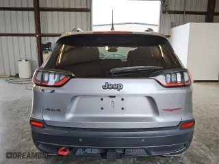 2019 Jeep Cherokee Trailhawk with VIN 1C4PJMBN8KD225791, listed as a Copart auction lot 84964384 with 119,509 mi miles and Clean Title. Bid and sale history available at carsss.com. Image 6.