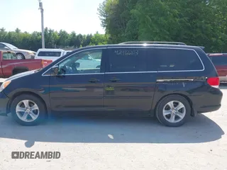 2009 Honda Odyssey Touring с VIN 5FNRL38999B018272, выставлен на аукционе IAAI как лот 42412203 с пробегом 154 987 миль миль и . История ставок и продаж доступна на DreamBid. Изображение 12.