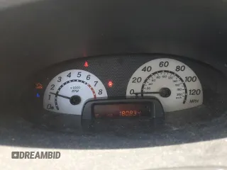 2004 Toyota ECHO with VIN JTDBT123140331964, listed as a Copart auction lot 59156135 with 180,834 mi miles and Salvage title. Bid and sale history available at DreamBid. Image 9.